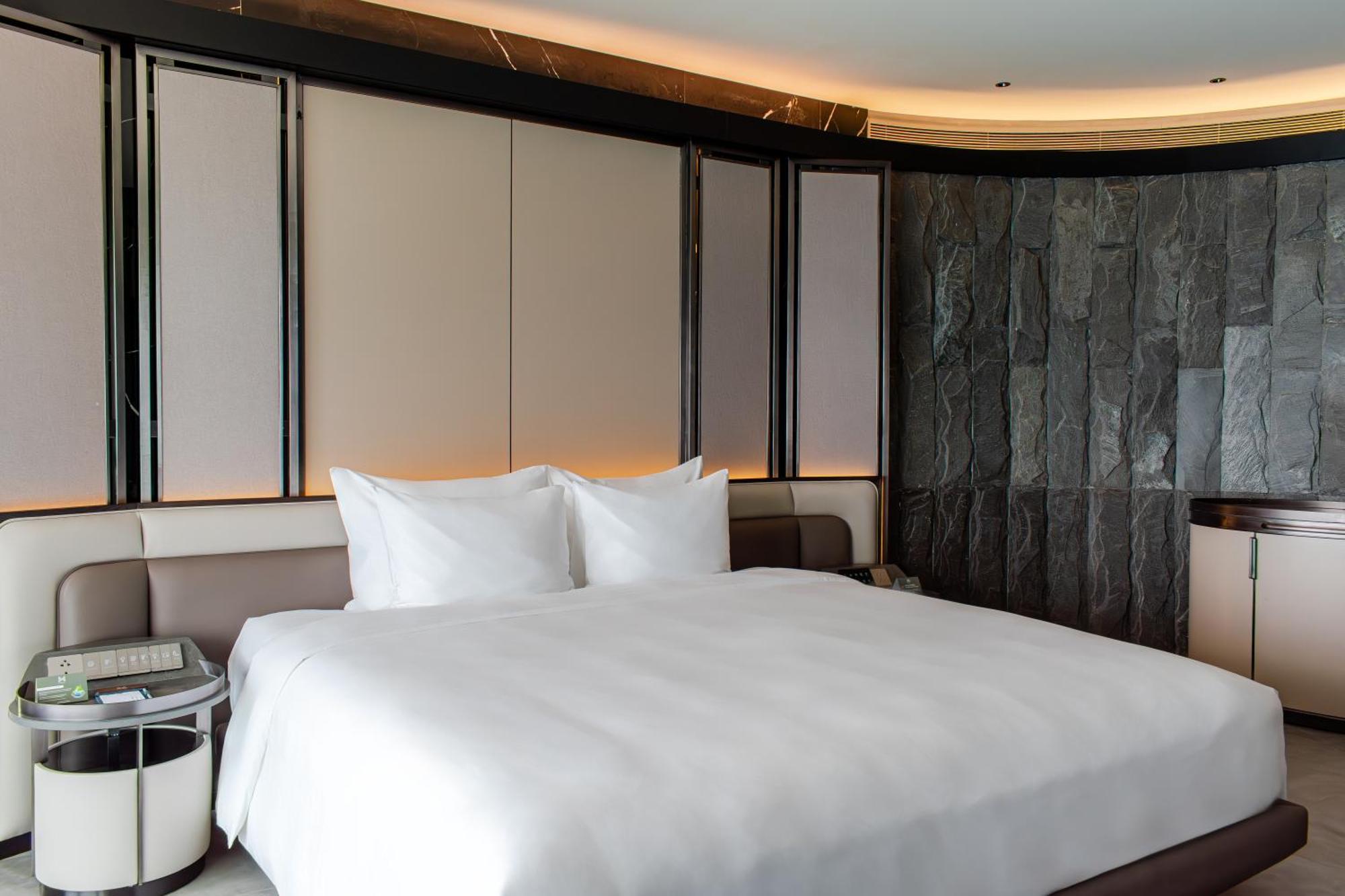 M Hotel Danang Kültér fotó A bedroom at the hotel