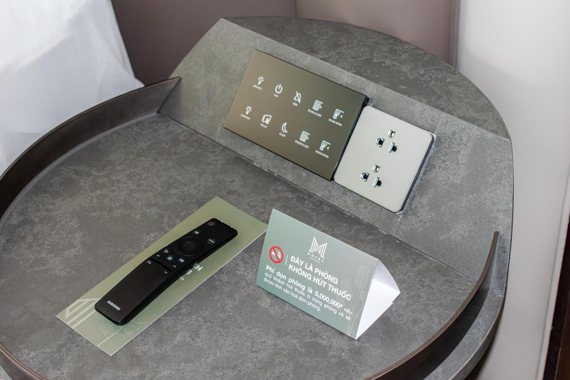 M Hotel Danang Kültér fotó A room control panel